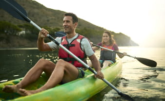 Family enjoying a kayaking vacation