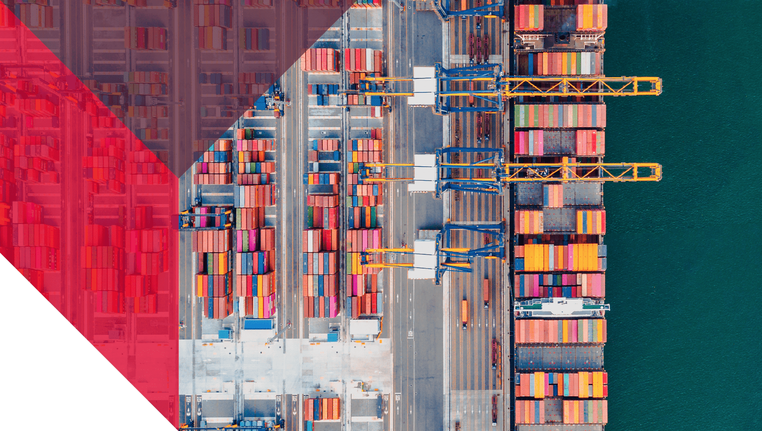 Ariel view of colorful storage crates on ocean liner to represent market trends.