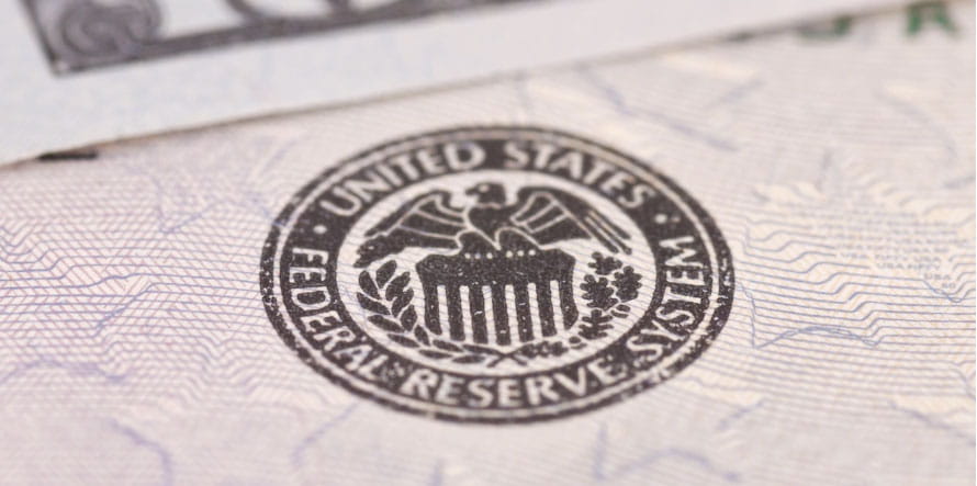 United States Federal Reserve logo on envelope.